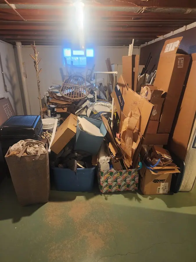 Roll-off dumpster container at job site for Concrete Dumpster Rental in Westfield